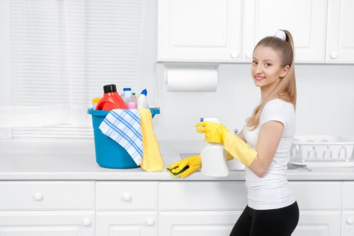 Professional office cleaners working in a Shoreditch workspace